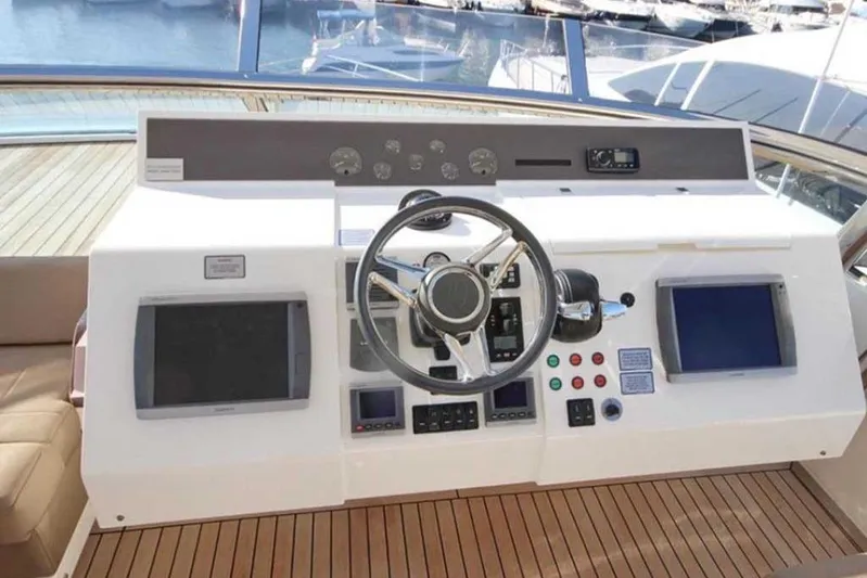  Yacht Photos Pics Helm of 2014 Fairline Squadron 78 yacht with dual screens and controls.