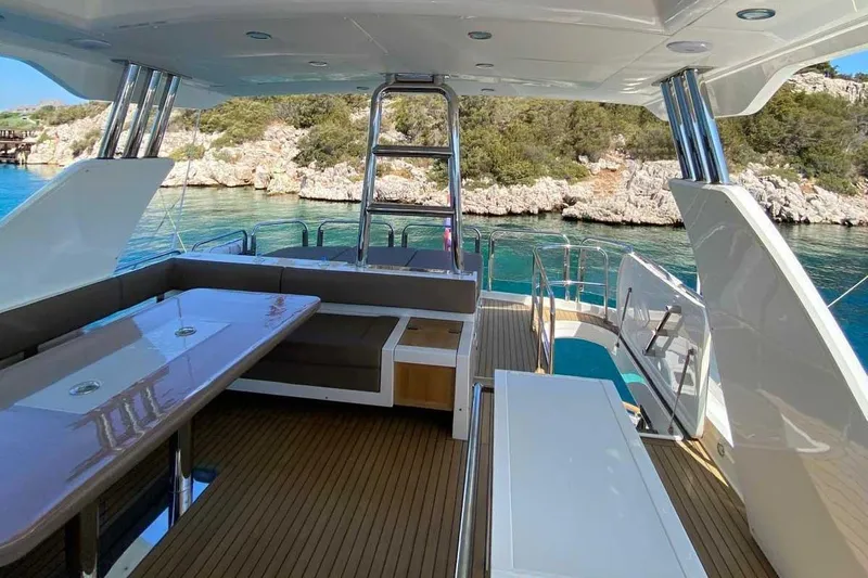  Yacht Photos Pics Luxurious 2014 Fairline Squadron 78 yacht interior with elegant seating and scenic ocean view.