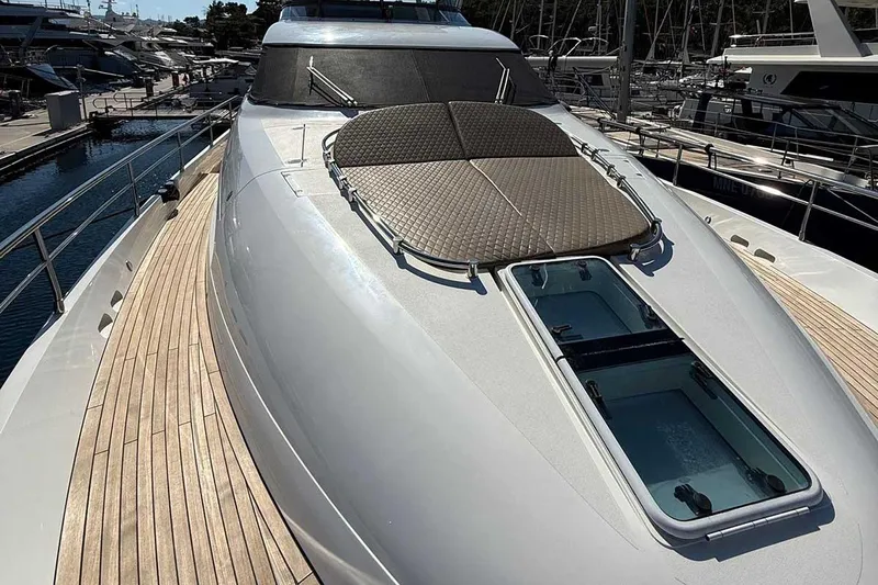  Yacht Photos Pics 2014 Fairline Squadron 78 yacht deck with sunpad and skylight in marina.