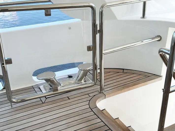 Island Heiress Yacht Photos Pics Teak deck and stainless steel railings on 1996 Cheoy Lee 145 Global Series yacht.
