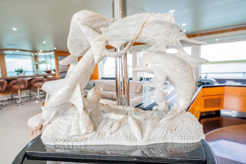 Island Heiress Yacht Photos Pics Marble fish sculpture on Cheoy Lee 145 Global Series yacht, 1996 interior.