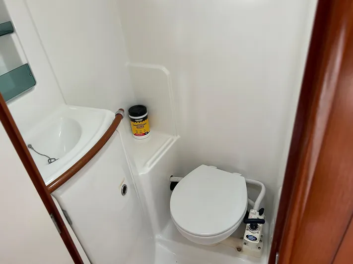 Flaneuse Yacht Photos Pics 2003 Beneteau 36.7 yacht bathroom with toilet and sink.