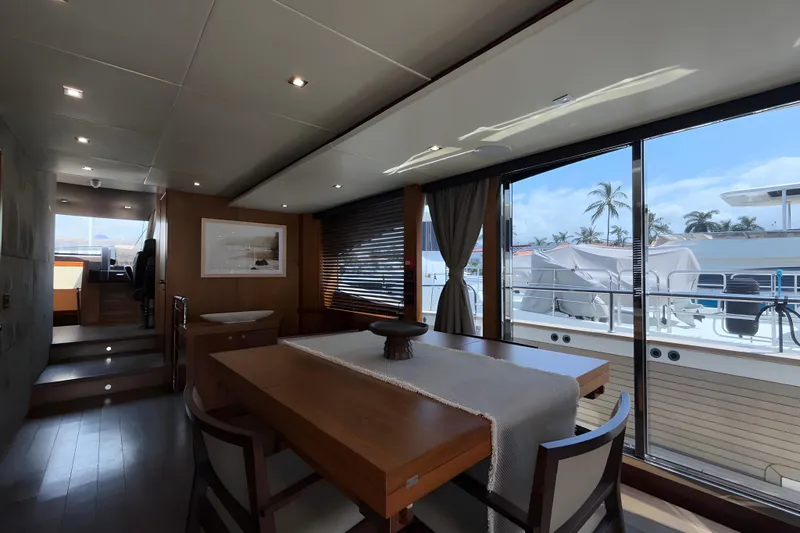 Kastelan Yacht Photos Pics Luxurious interior of 2015 Sunseeker 28 Metre Yacht with elegant dining area and panoramic windows.