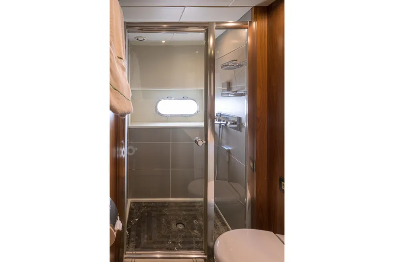 Kastelan Yacht Photos Pics Luxurious bathroom in 2015 Sunseeker 28 Metre Yacht with modern shower and sleek design.