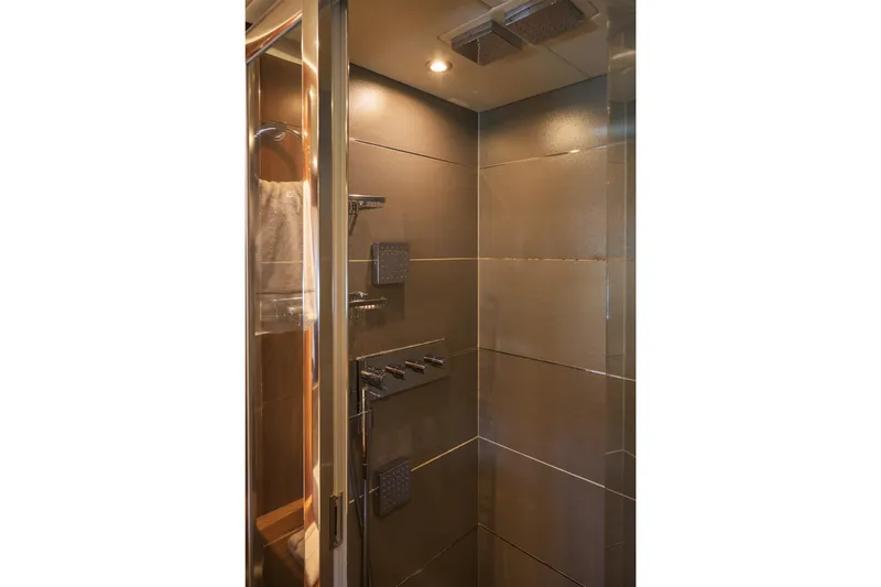 Kastelan Yacht Photos Pics Luxurious shower in 2015 Sunseeker 28 Metre Yacht, featuring modern fixtures and elegant design.