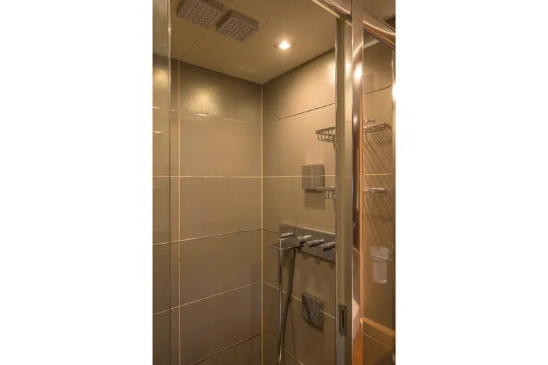 Kastelan Yacht Photos Pics Luxurious shower in 2015 Sunseeker 28 Metre Yacht, featuring modern fixtures and elegant design.