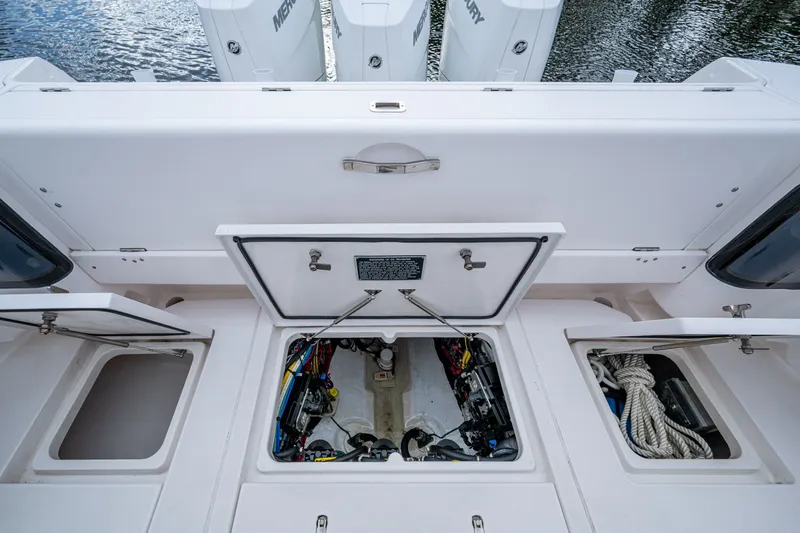 Mrs Diagnosis Yacht Photos Pics 2020 Intrepid 407 Panacea boat storage compartments and engine access.