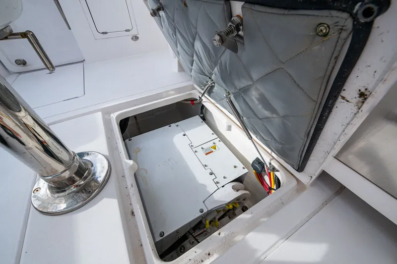 Mrs Diagnosis Yacht Photos Pics Open hatch on 2020 Intrepid 407 Panacea boat, revealing internal components and wiring.