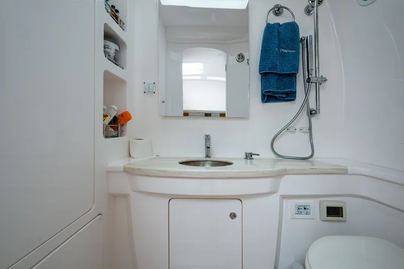 Mrs Diagnosis Yacht Photos Pics Luxurious bathroom in 2020 Intrepid 407 Panacea yacht with modern fixtures and storage.