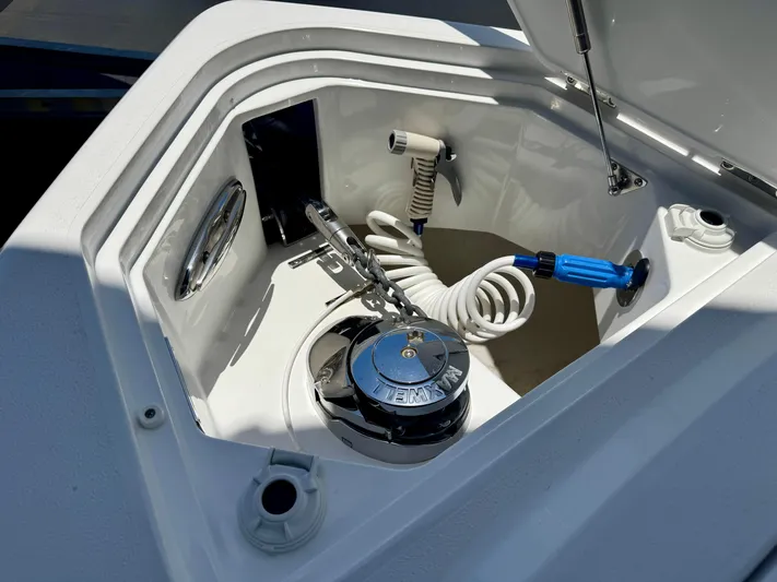  Yacht Photos Pics Anchor locker of 2025 Intrepid 41 Panacea with coiled hose and winch.