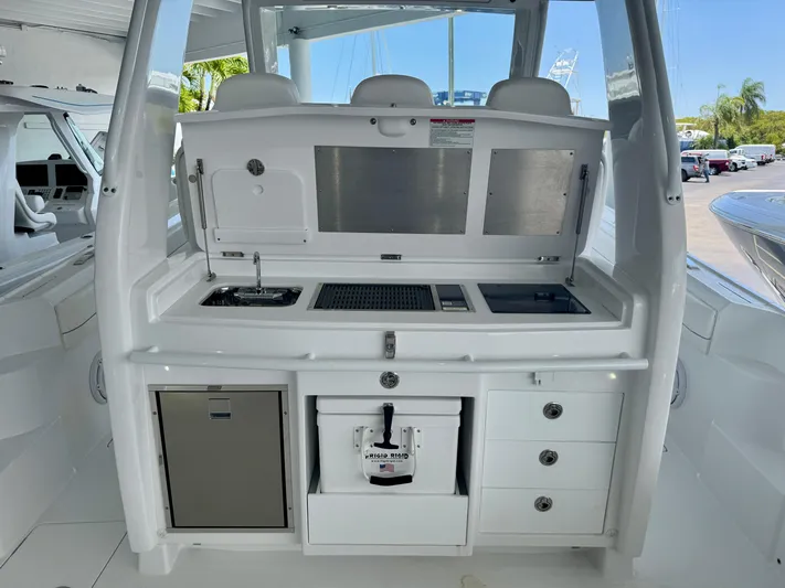  Yacht Photos Pics 2025 Intrepid 41 Panacea boat galley with sink, storage, and modern amenities.