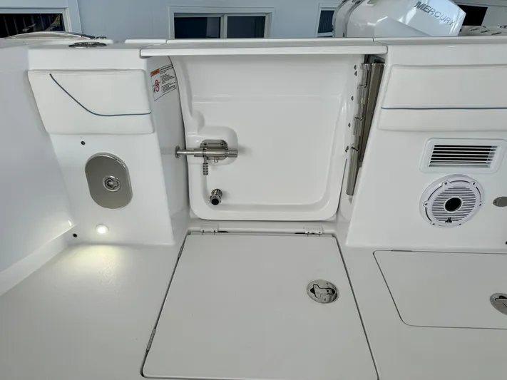  Yacht Photos Pics 2025 Intrepid 41 Panacea boat interior, featuring storage compartments and modern fixtures.