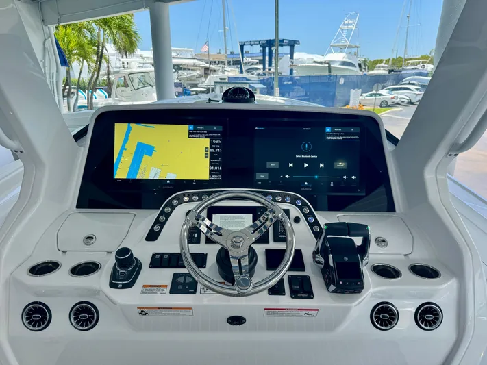  Yacht Photos Pics Helm of 2025 Intrepid 41 Panacea with advanced navigation and control systems.