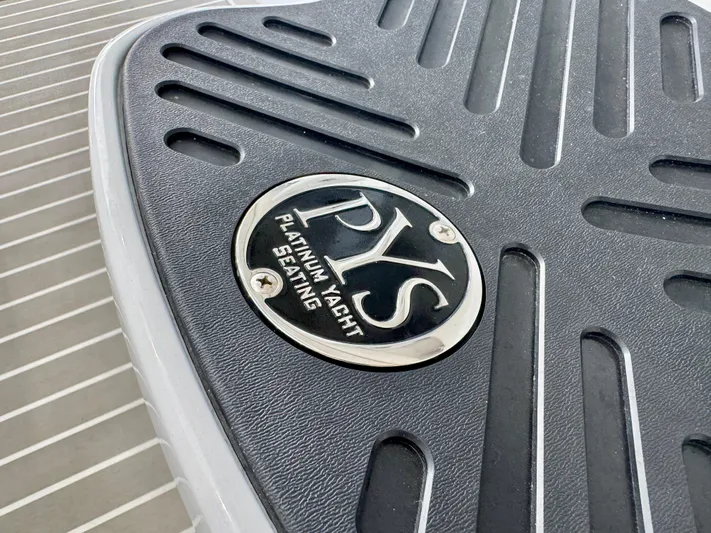  Yacht Photos Pics Close-up of Platinum Yacht Seating emblem on 2025 Intrepid 41 Panacea boat.