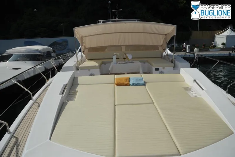 Elisa II Yacht Photos Pics 2018 Azimut 77 S yacht with spacious sunbathing deck and cushioned seating.