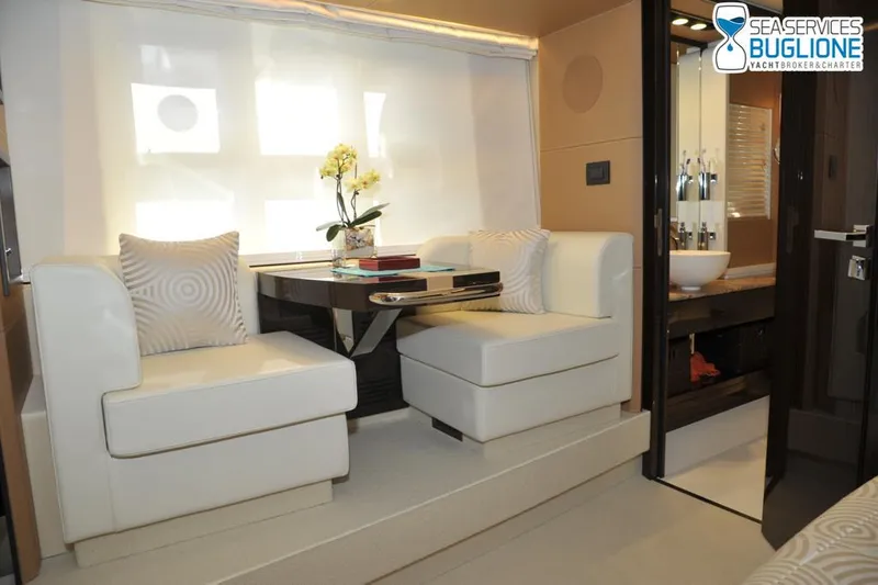 Elisa II Yacht Photos Pics Luxurious interior of 2018 Azimut 77 S yacht with elegant seating and decor.