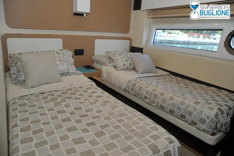Elisa II Yacht Photos Pics Interior of 2018 Azimut 77 S yacht with twin beds and modern decor.