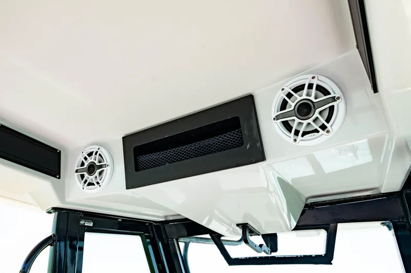  Yacht Photos Pics 2022 Crevalle 33 CSF boat interior with speakers and ventilation system.