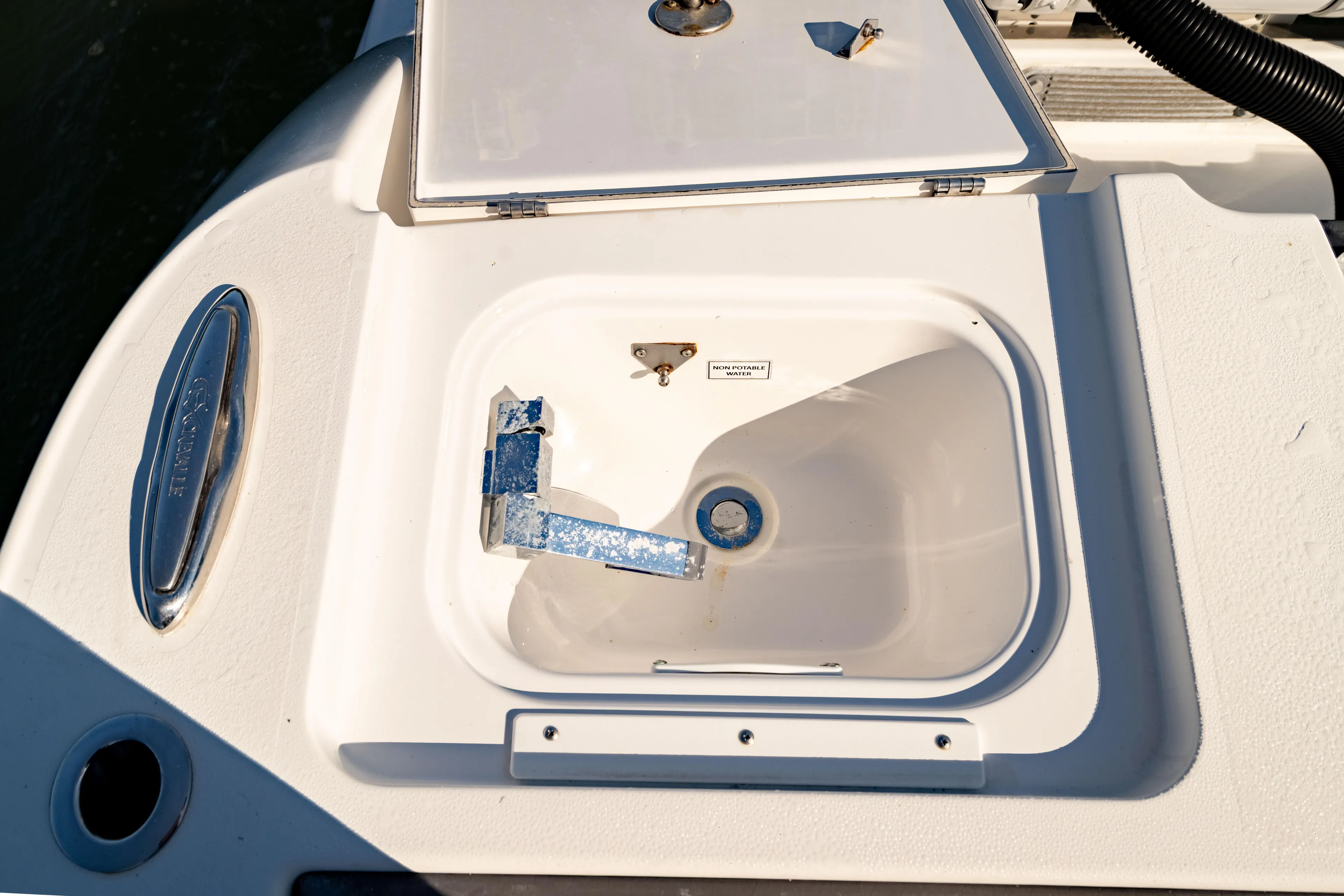  Yacht Photos Pics Crevalle 33 CSF 2022 boat sink with non-potable water label.