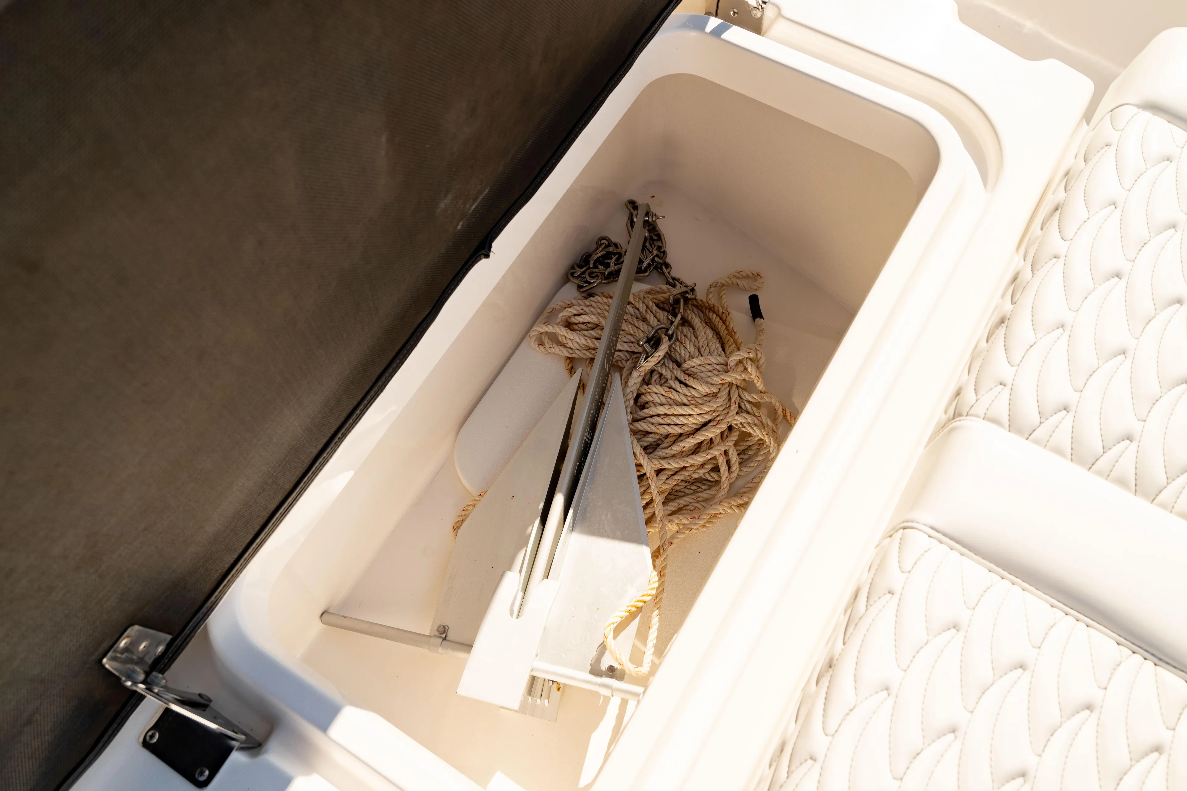  Yacht Photos Pics Storage compartment with anchor and rope on 2022 Crevalle 33 CSF boat.