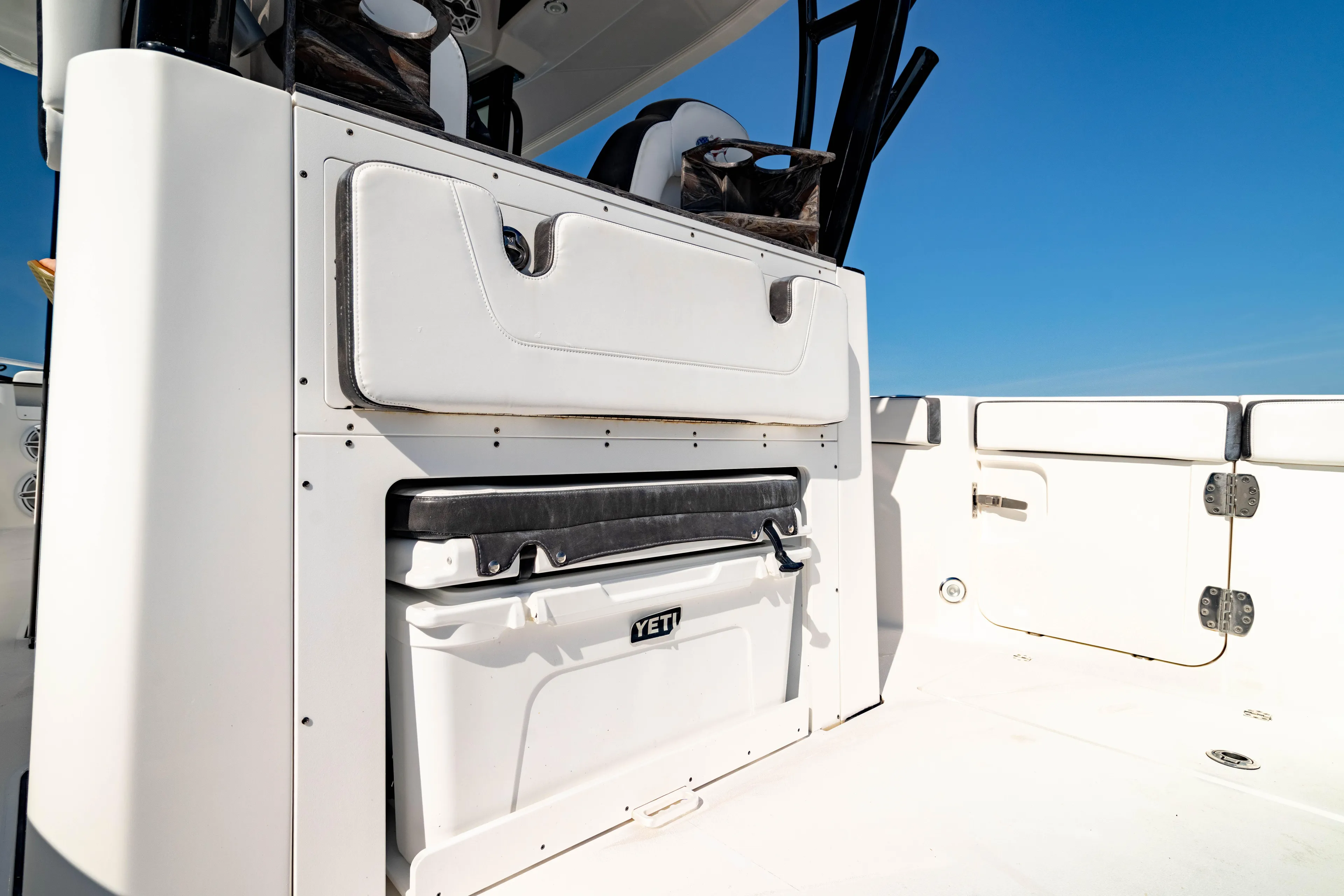  Yacht Photos Pics 2022 Crevalle 33 CSF boat interior with YETI cooler and seating.