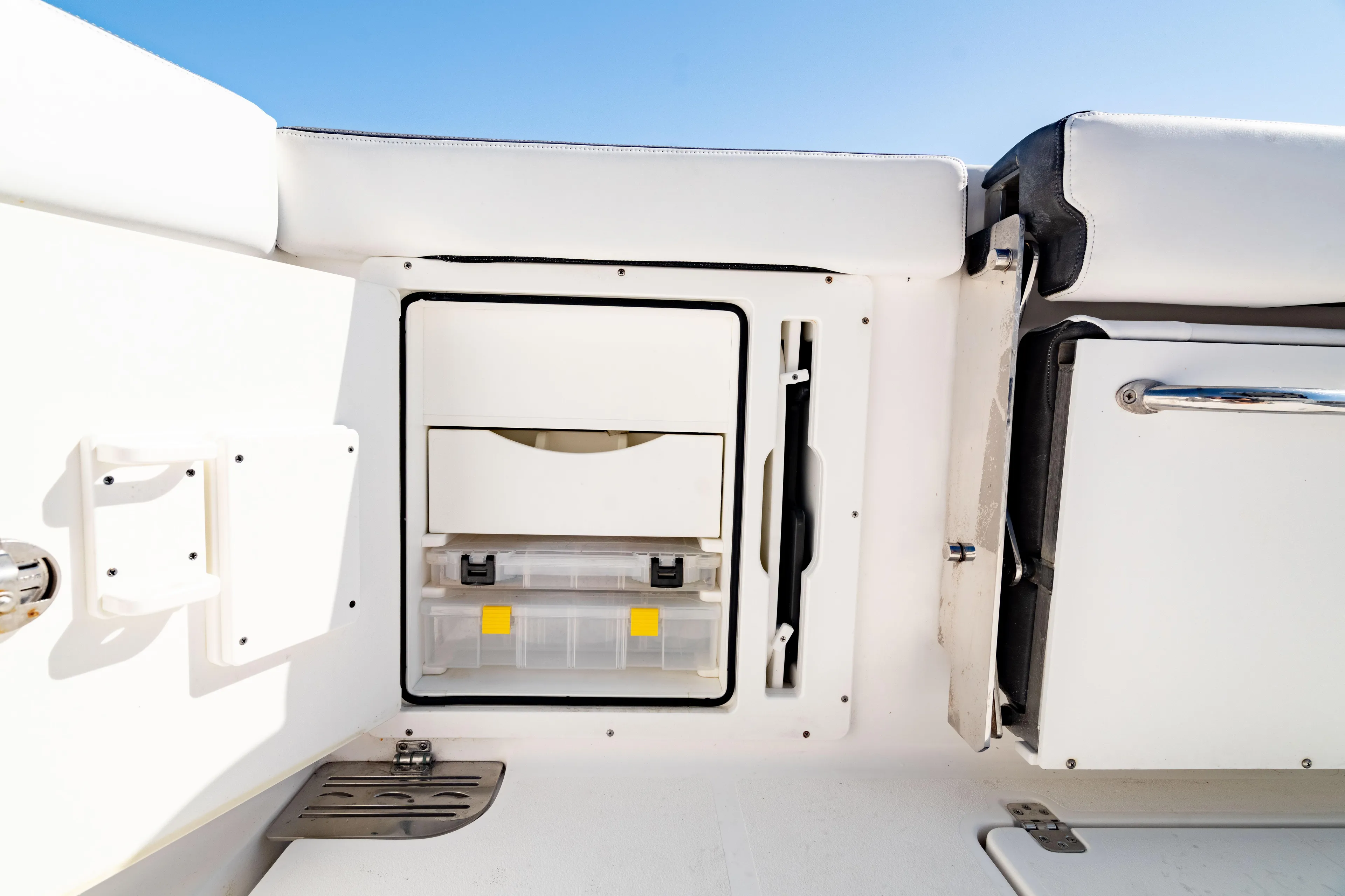  Yacht Photos Pics 2022 Crevalle 33 CSF boat storage compartment with drawers and tackle boxes.