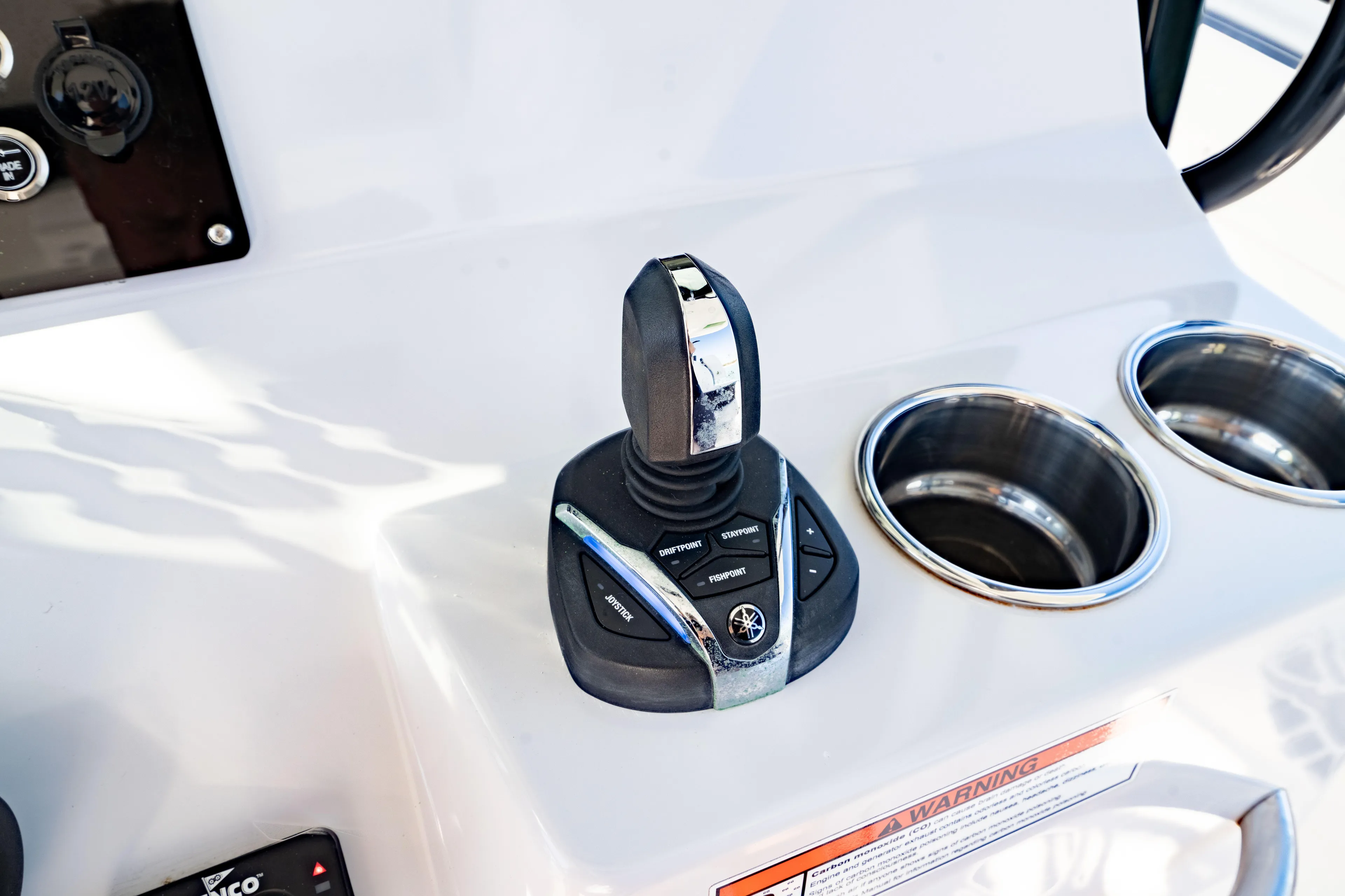  Yacht Photos Pics 2022 Crevalle 33 CSF boat joystick control and cup holders on console.