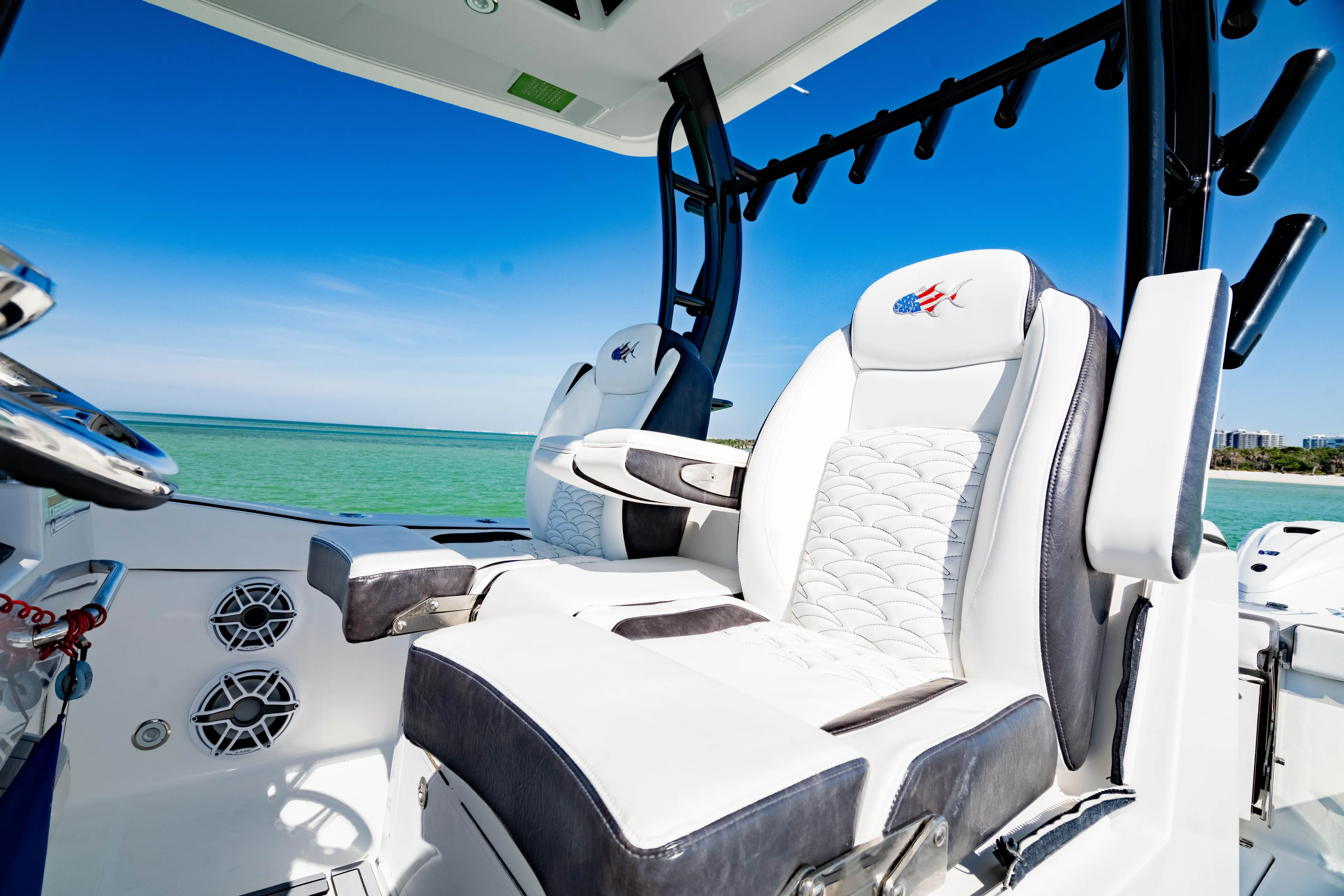  Yacht Photos Pics 2022 Crevalle 33 CSF boat interior with luxurious seating and ocean view.