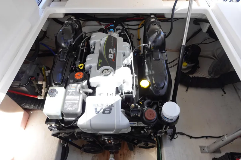  Yacht Photos Pics Engine compartment of a 2018 Monterey 295 Sport Yacht, featuring a powerful V8 engine.