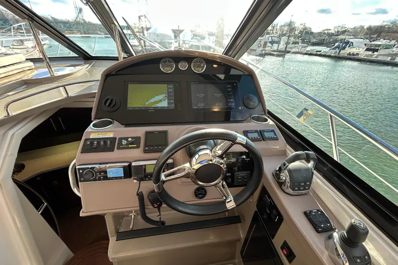  Yacht Photos Pics Cockpit of 2018 Regal 42 Sport Coupe with advanced navigation systems and controls.
