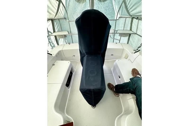  Yacht Photos Pics Interior view of a 2015 Catalina 315 sailboat cockpit with covered helm.