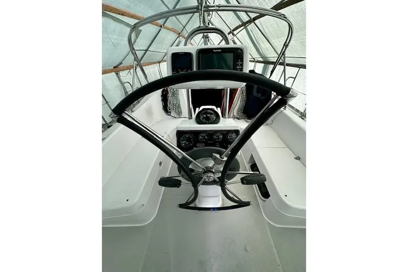  Yacht Photos Pics Cockpit of 2015 Catalina 315 sailboat with steering wheel and navigation instruments.