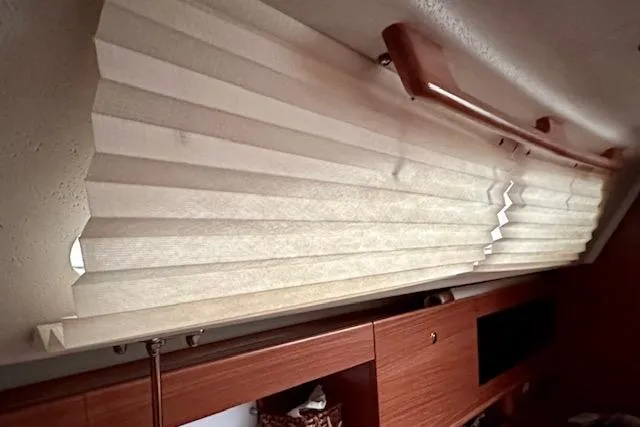  Yacht Photos Pics Interior view of 2015 Catalina 315 yacht with pleated window blinds.