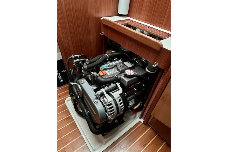  Yacht Photos Pics Engine compartment of a 2015 Catalina 315 sailboat, showcasing detailed mechanical components.