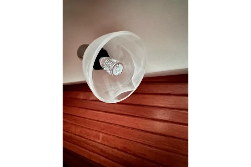  Yacht Photos Pics Ceiling light fixture inside a 2015 Catalina 315 boat cabin.
