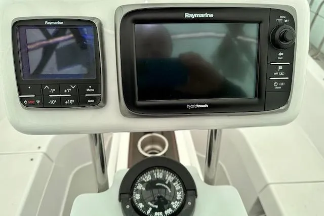  Yacht Photos Pics Raymarine navigation system and compass on 2015 Catalina 315 yacht dashboard.