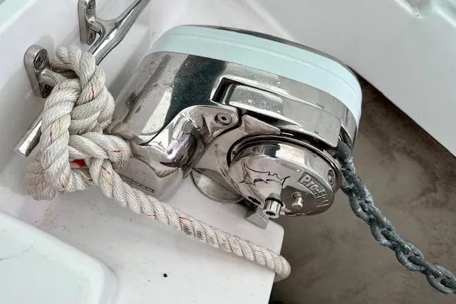  Yacht Photos Pics Anchor windlass on 2015 Catalina 315 sailboat with secured rope and chain.