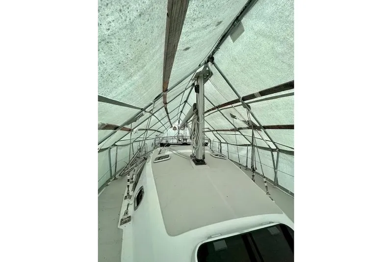 Yacht Photos Pics 2015 Catalina 315 sailboat under protective cover, view of deck and rigging.