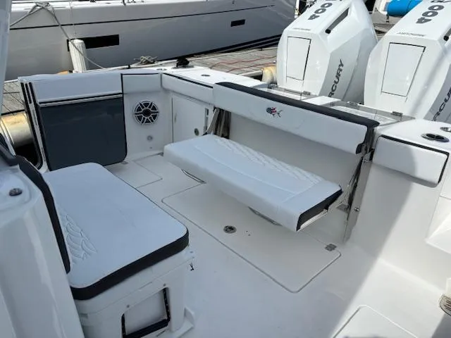  Yacht Photos Pics 2025 Crevalle 33 CTF boat interior with seating and Mercury engines.