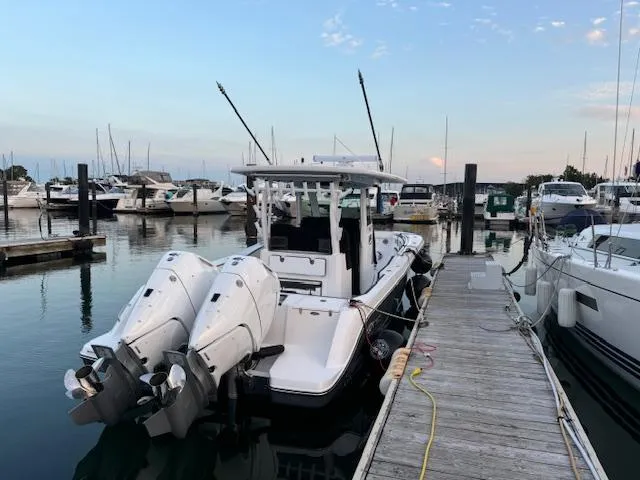  Yacht Photos Pics 2025 Crevalle 33 CTF boat docked at marina with twin outboard engines.