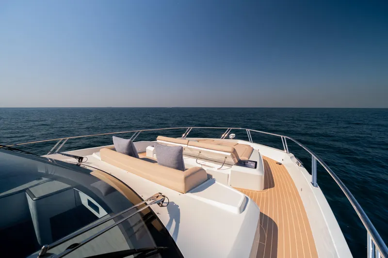  Yacht Photos Pics Luxurious 2025 Galeon 560 Fly yacht deck with ocean view and elegant seating.