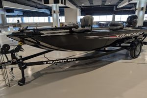2025 Tracker Panfish 17 boat on display indoors, featuring sleek design and modern equipment.