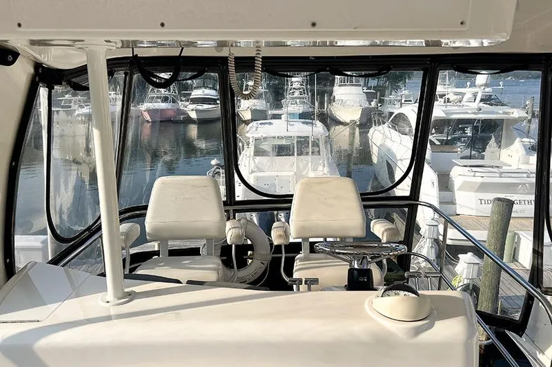  Yacht Photos Pics Interior view of 2002 Silverton 42 Convertible yacht at marina.