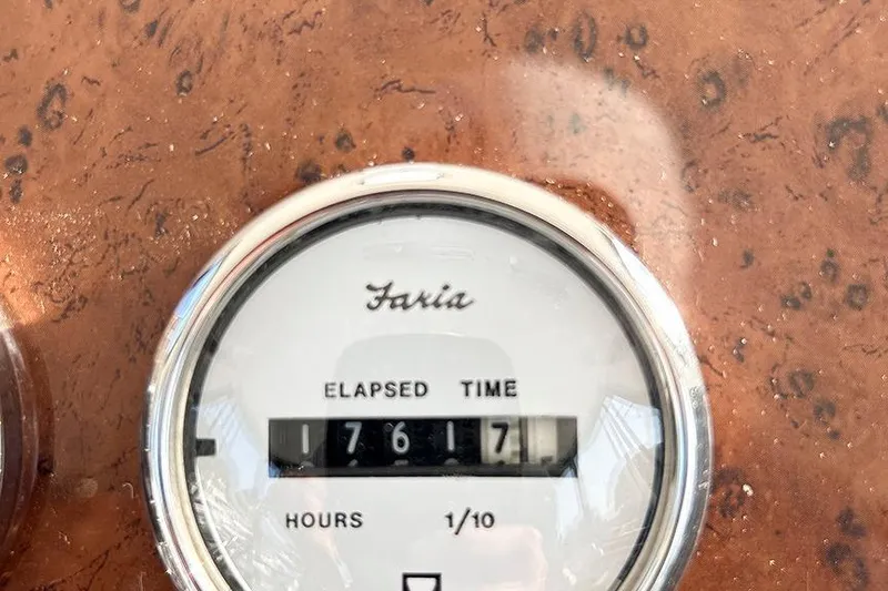  Yacht Photos Pics Faria elapsed time gauge showing 1761.7 hours on 2002 Silverton 42 Convertible.