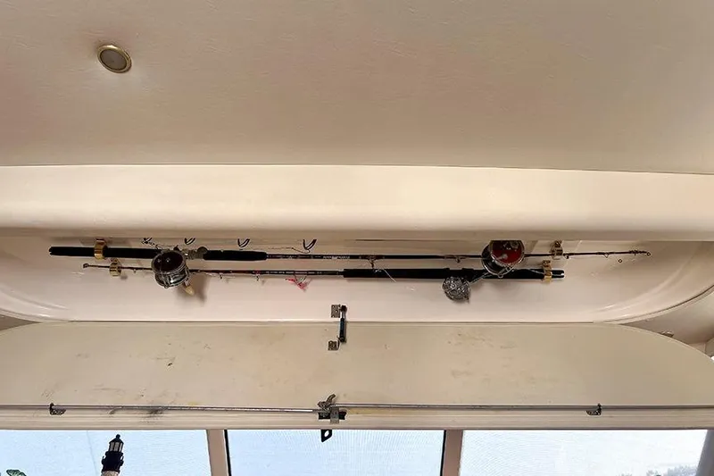  Yacht Photos Pics Fishing rods stored on a 2002 Silverton 42 Convertible boat ceiling.