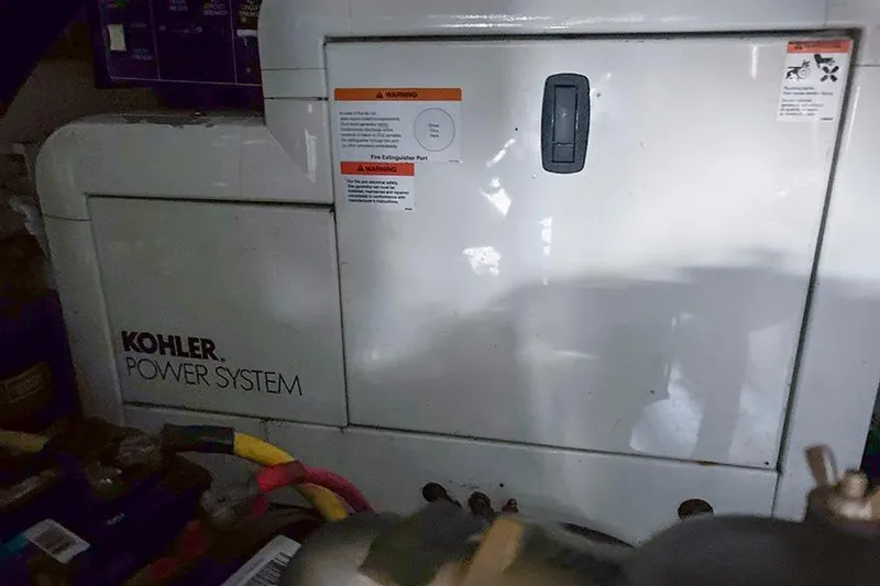  Yacht Photos Pics Kohler power system in a 2002 Silverton 42 Convertible boat engine room.