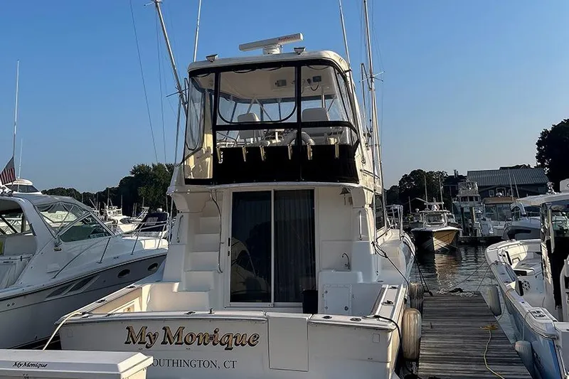  Yacht Photos Pics 2002 Silverton 42 Convertible yacht docked, named "My Monique," in Southington, CT marina.