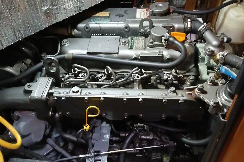 Nowhere To Be Yacht Photos Pics Engine compartment of a 2006 Island Packet 440 sailboat, showcasing detailed mechanical components.