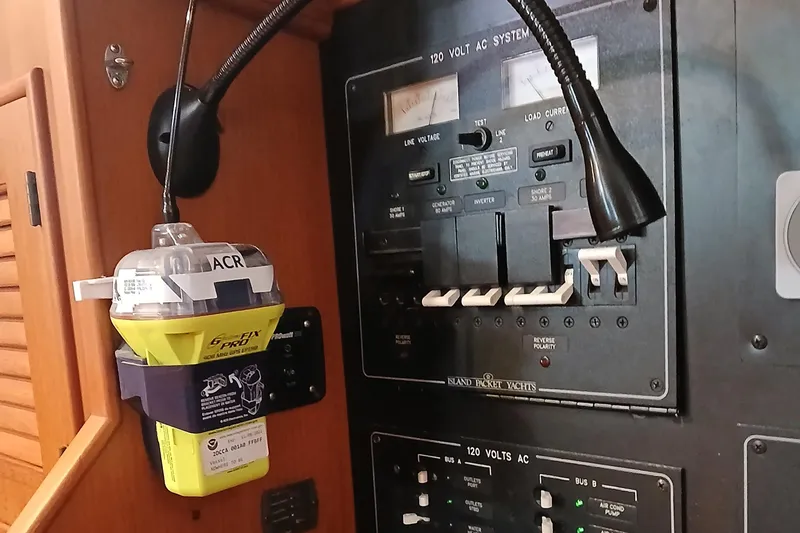 Nowhere To Be Yacht Photos Pics Electrical panel and emergency beacon on a 2006 Island Packet 440 yacht.
