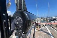 2023 Solaris 50 yacht deck with rigging and marina view.